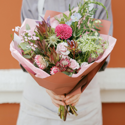 Florists Choice - Hand Tied - Our expert, highly qualified florists will design a hand-tied filled with the finest quality seasonal flowers, perfectly wrapped and delivered in water.